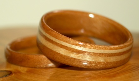 cherry wood ring with ash and maple offset inlays