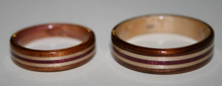 Wooden rings with inlaid bands