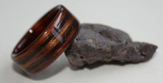 Hawaiian Koa ring with two inlaid bands of Lava Rock