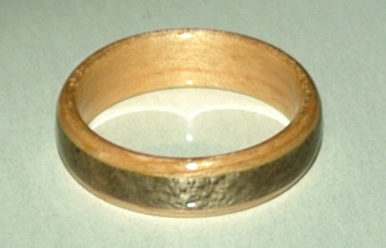 birds eye maple wood ring with a greyed maple band