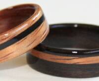 Blackwood as the primary wood and as a spiraled inlaid band