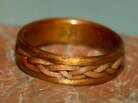 Koa wood ring with a juniper heart wood braid