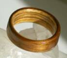 Koa wood ring with a zebra wood lining