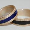 Maple Wood Rings with Birch Liners and wide stone inlays.  Her ring is LAPIS LAZULI, his is LAVA ROCK.