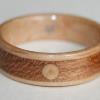 This is not a stone or shell inlay example but rather an example of the Full Moon Inlay. This inlay is birds eye Maple but it can also be crushed stone or shell or ....