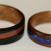 Rosewood and Golden Koa with a Lapis Lazuli inlaid band. Blackwood with golden Koa and a Juniper heartwood inlay.