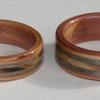 Juniper Heart Wood Rings with Bethlehem Olive wood inlays bordered by greyed Maple.