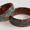 Rose wood rings with Abalone Shell and Eilat Stone inlays.