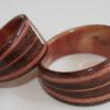 Amie and Scott designed their rings with three inlays meeting to symbolize the two of them and their child.