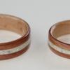Juniper heartwood lined with bird's eye maple and inlaid with mother of pearl inlays
