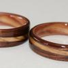 Another Koa Wood Ring design with spiraled BETHLEHEM OLIVE wood inlays and Juniper heartwood liners.