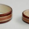 The very narrow inlays on this wooden ring bordering the centered Golden Koa inlay are CLEAR JUNIPER WOOD, the interior is Birch.