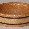 BIRCH.  This is a Birds Eye Maple wood ring with a wide BIRCH center inlay bordered by two narrow black walnut bands.  A good design for seeing the difference between Birds Eye Maple and BIRCH wood.