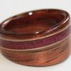 Hawaiian KOA wood ring with an inlay of Purpleheart wood and narrow bordering inlays of bamboo