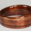 Gently tapered KOA wood ring with golden streaks