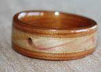 Juniper heartwood ring with inlaid stone and Bethlehem Olive wood liner