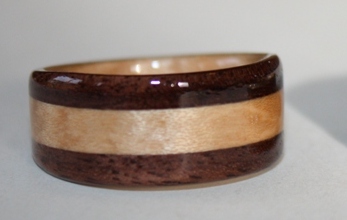 Black Walnut Ring with curly maple inlay and liner