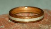 Wood ring with found cystal inlay