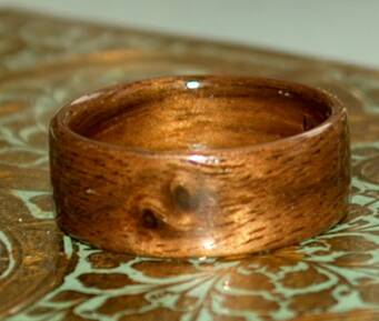 Natural Yin Yang markings on a black walnut wood ring  1